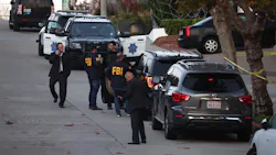 San Francisco police officers and FBI agents gather in front of the home of U.S. Speaker of the House Nancy Pelosi on Friday after her husband was violently attacked by an intruder. San Francisco police officers and FBI agents gather in front of the home of U.S. Speaker of the House Nancy Pelosi on Friday after her husband was violently attacked by an intruder.