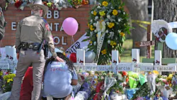Crosses bear the names of the victims of the Robb Elementary School shooting in Uvalde. Crosses bear the names of the victims of the Robb Elementary School shooting in Uvalde.
