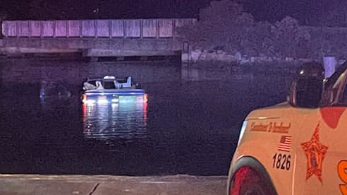 A Walton County, FL, sheriff's deputy jumped into a bayou to rescue a man trapped in a sinking pickup truck late Saturday.