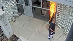 Surveillance footage shows a man setting fire to the guard booth outside the FBI Chicago headquarters on Nov. 4. Surveillance footage shows a man setting fire to the guard booth outside the FBI Chicago headquarters on Nov. 4.