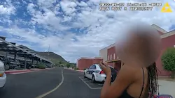 A Phoenix school resource officer disarms a woman who brandished a gun during an on-campus domestic dispute in September. A Phoenix school resource officer disarms a woman who brandished a gun during an on-campus domestic dispute in September.