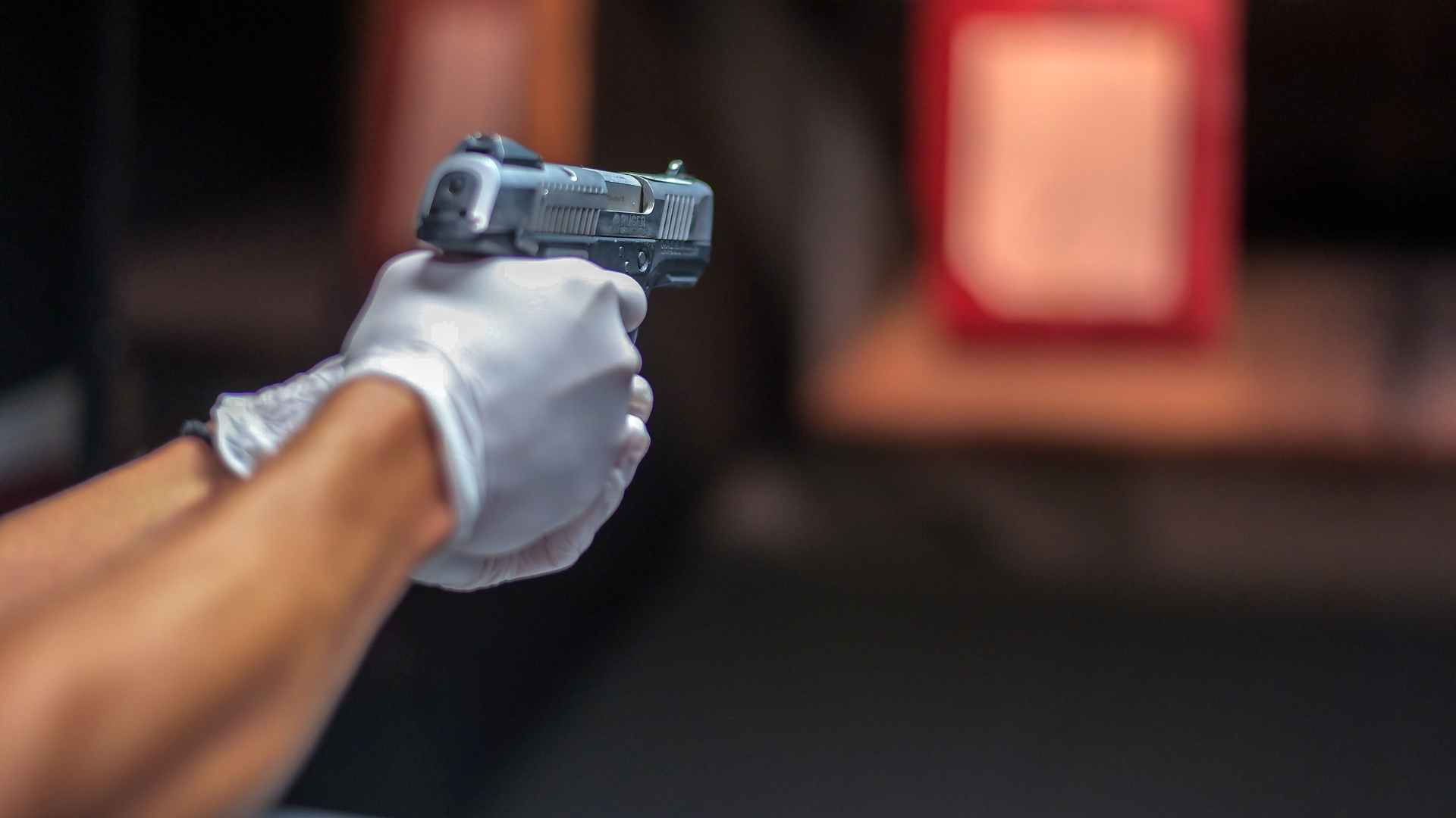 Inside the Baltimore Police Department firearms range, forensic scientist Zo&euml; Krohn demonstrated her job during an open house.