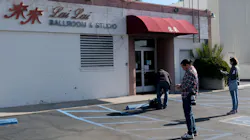Reporters gather at Lai Lai Ballroom and Studio in Alhambra, CA, on Sunday. Reporters gather at Lai Lai Ballroom and Studio in Alhambra, CA, on Sunday.