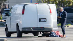 Investigators check out a van where the driver is suspected in a mass shooting at a Monterey Park, CA, dance studio Sunday that killed 10. Investigators check out a van where the driver is suspected in a mass shooting at a Monterey Park, CA, dance studio Sunday that killed 10.