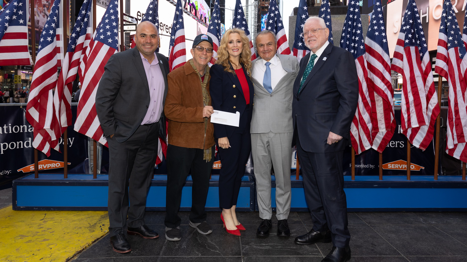 Henry Repeating Arms presented a $25,000 donation to the First Responders Children&rsquo;s Foundation during a National First Responders Day ceremony held in Times Square. From L to R: FRCF Chief Philanthropy Officer, Randy Acosta; FRCF Vice Chairman, Laurence Levy; FRCF President & CEO, Jillian Crane; Henry Founder & CEO, Anthony Imperato; FRCF Founder & Chairman, Alfred Kahn.