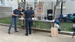 The staff of Saving a Hero's Place works on an Honor Chair outside the National Law Enforcement Museum in Washington, D.C. The staff of Saving a Hero's Place works on an Honor Chair outside the National Law Enforcement Museum in Washington, D.C.