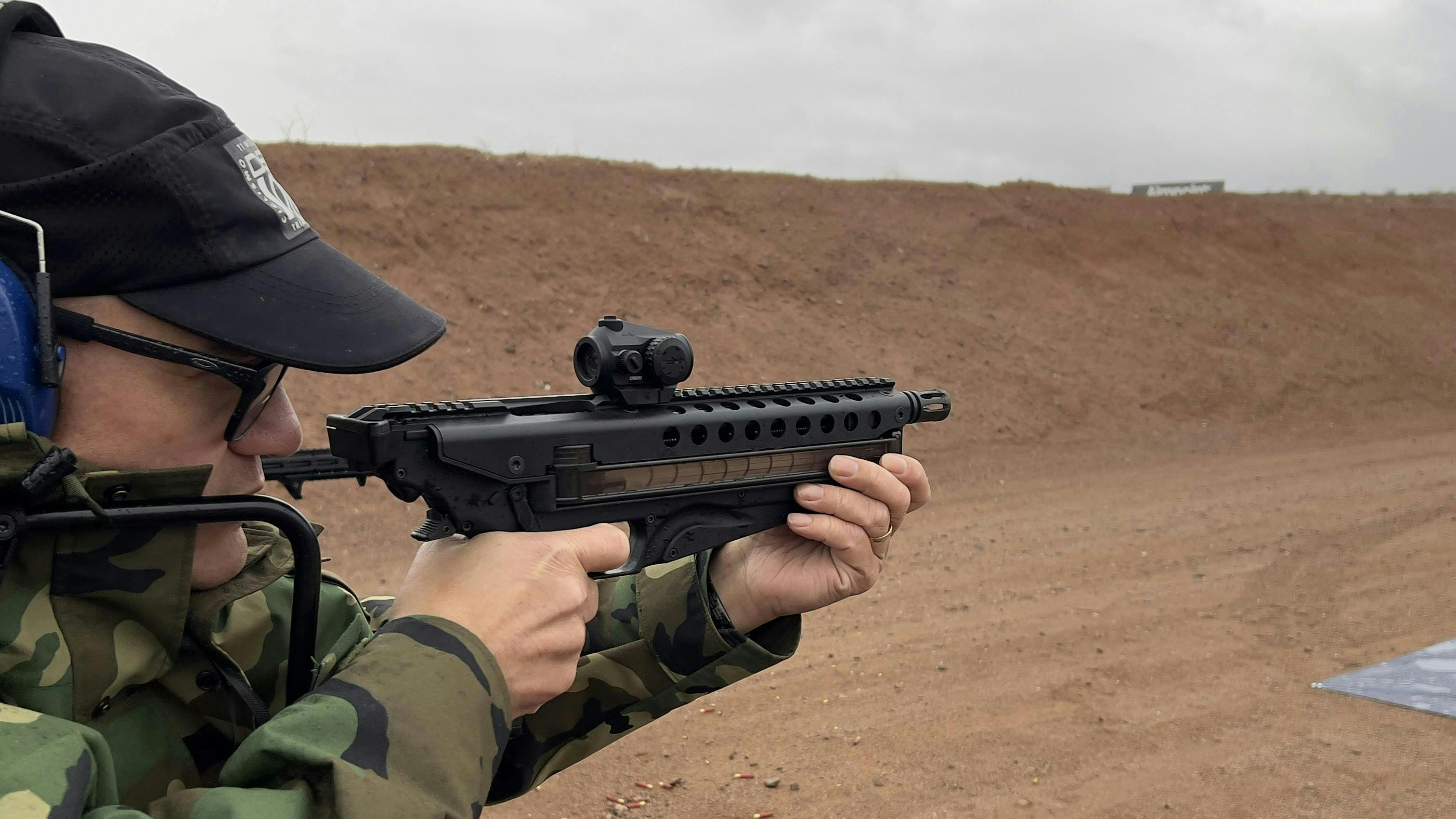 Lindsey shot the Kel-Tec R50 Defender, a 5.7 X 28 mm gun that has a 50 round capacity. Kel-Tec boasts that this gun is a tack driver, and we proved this on the range. It weighs 4.3 pounds unloaded, and folds down to 16.4'.