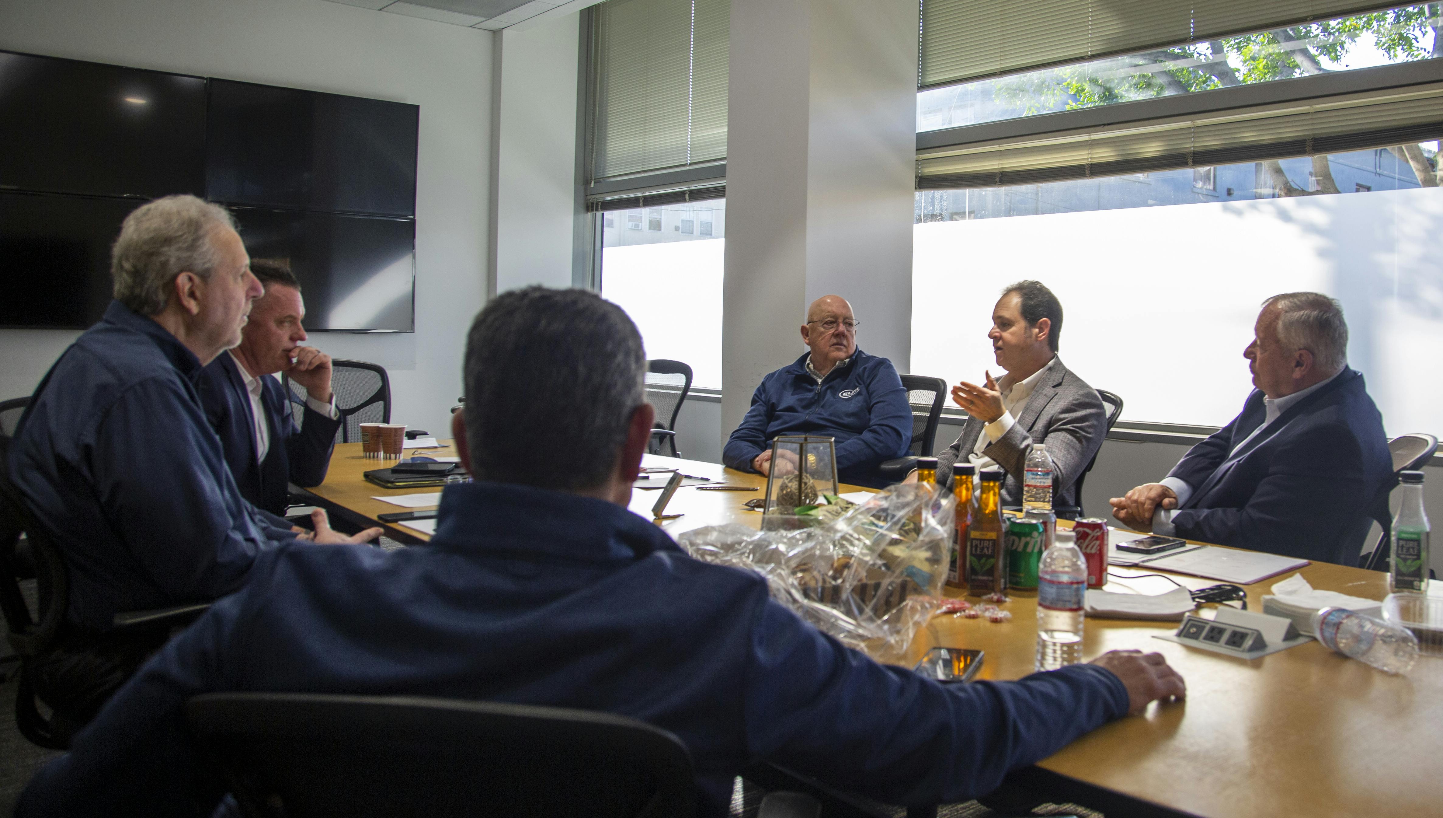 Clockwise from the bottom: Mitch Tavera, Scott Goldfine, Rich Nevin, Tom Stone, Justin Feffer and Keith Bushey are seen during a law enforcement roundtable hosted by Elite Interactive Solutions.