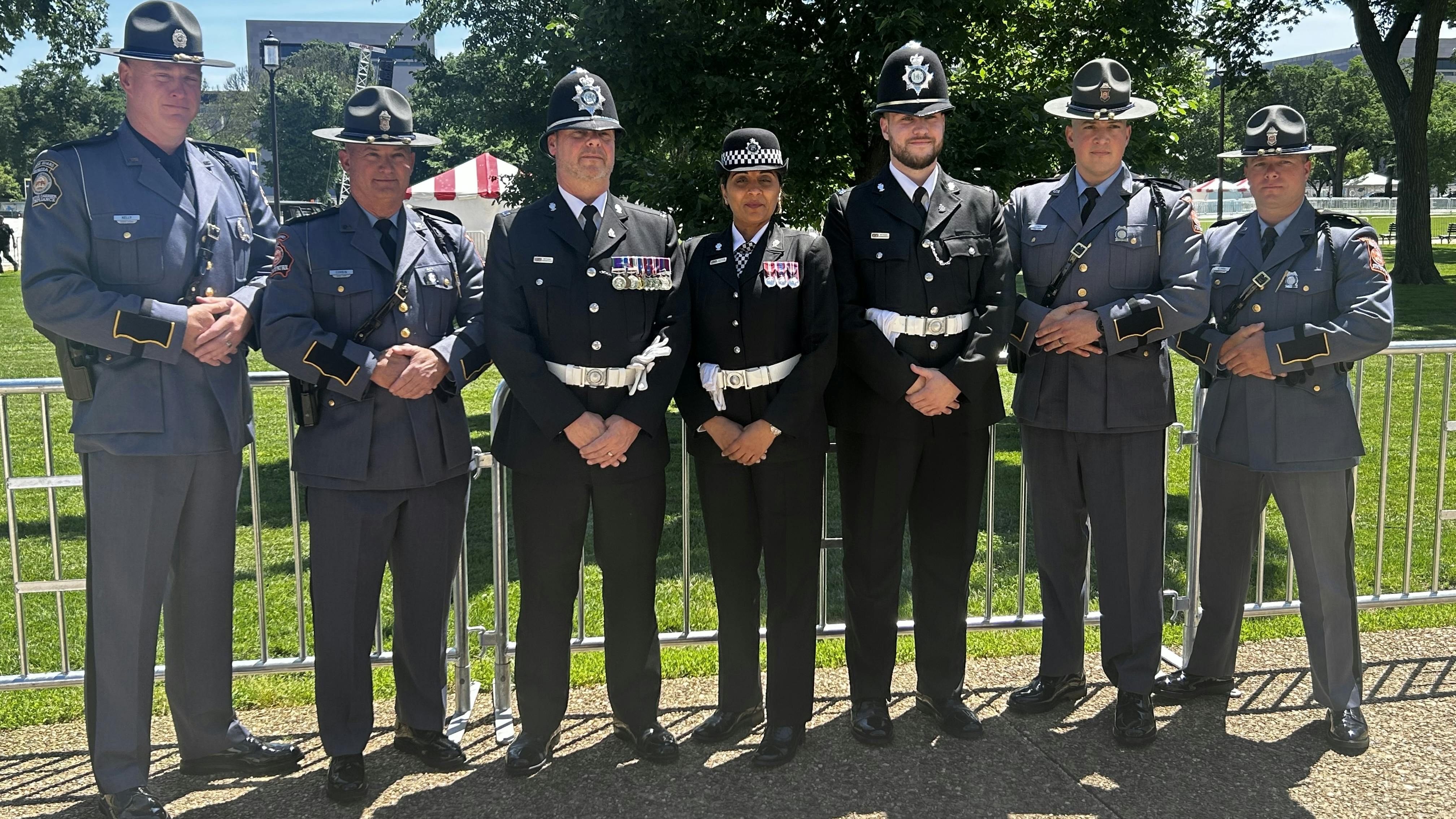 Officers from the UK and the Georgia State Patrol pose together at the Candlelight Vigil