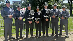Officers from the UK and the Georgia State Patrol pose together at the Candlelight Vigil Officers from the UK and the Georgia State Patrol pose together at the Candlelight Vigil