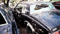 The Monte Carlo is seen covered in shotgun blasts following the shootout. The Monte Carlo is seen covered in shotgun blasts following the shootout.