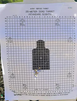 Small groups are easy with this gun. This one was rapid fire at 7 yards. Lindsey shot several similar groups at 25 yards. Small groups are easy with this gun. This one was rapid fire at 7 yards. Lindsey shot several similar groups at 25 yards.