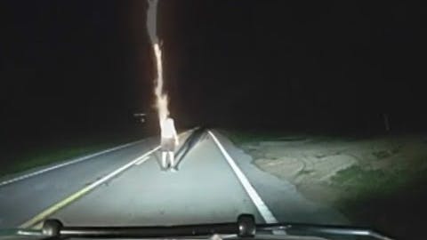 A Marion County Sheriff's Deputy Was Checking On A Man Walking Along The Highway When The Individual Shot A Flare And Then Began Removing His Pants And Throwing Money At The Deputy