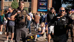 Minneapolis police officers work to contain the scene during an active shooter situation at the Annunciation Church on Wednesday. Minneapolis police officers work to contain the scene during an active shooter situation at the Annunciation Church on Wednesday.