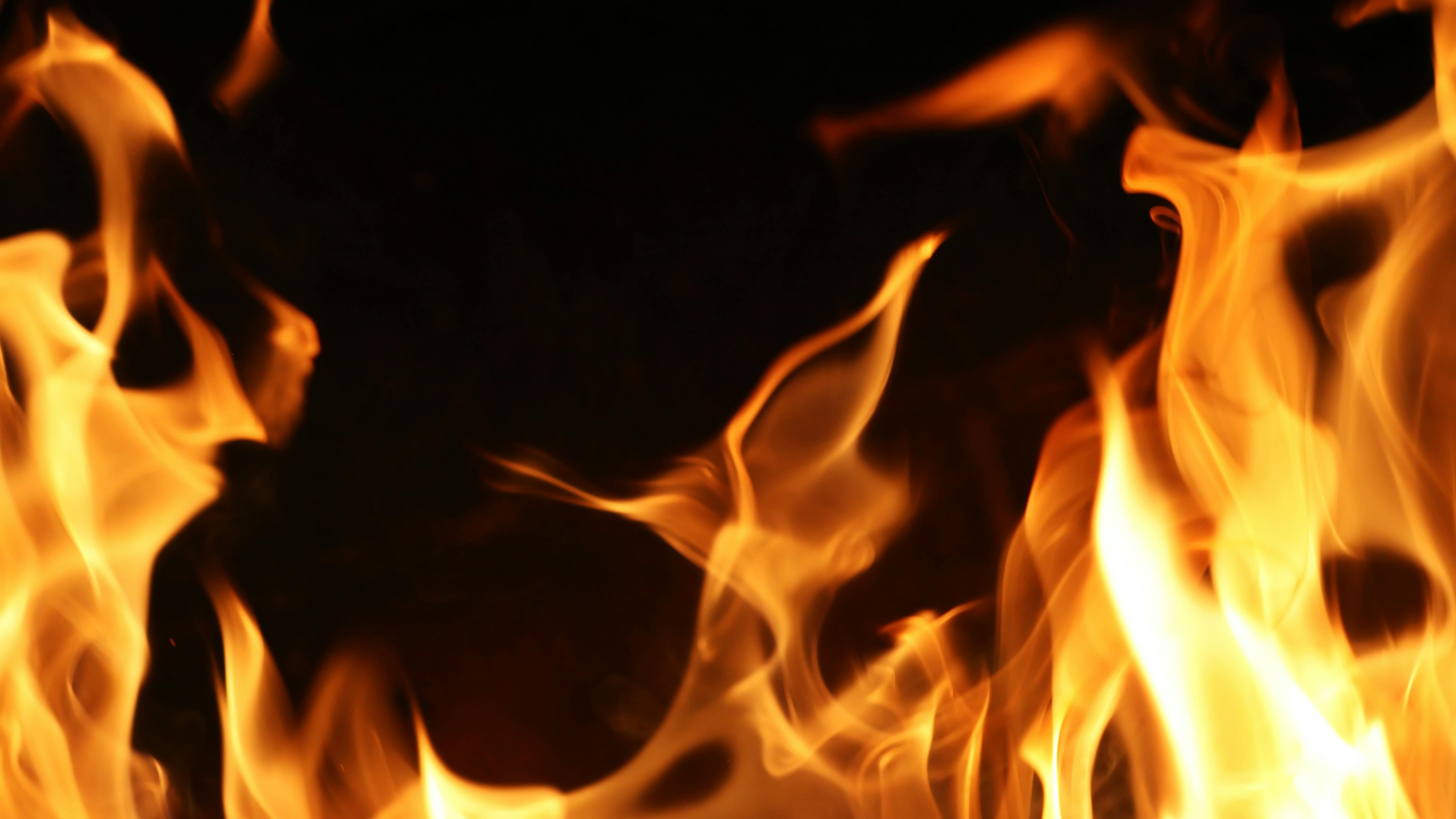 Michigan State Police troopers save disabled woman from house fire.