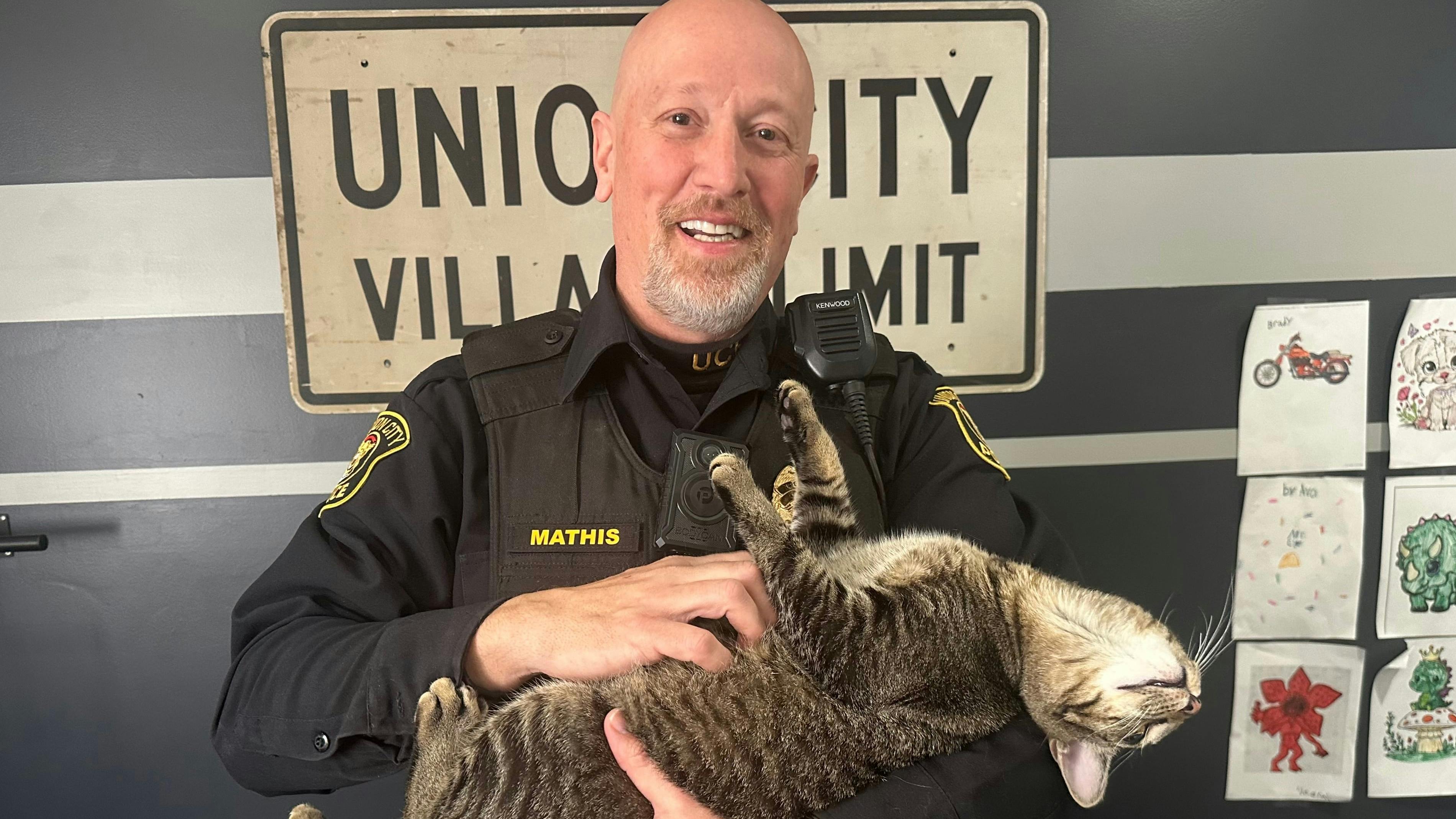 Union City, MI, Police Chief Chris Mathis and Officer Ezra.