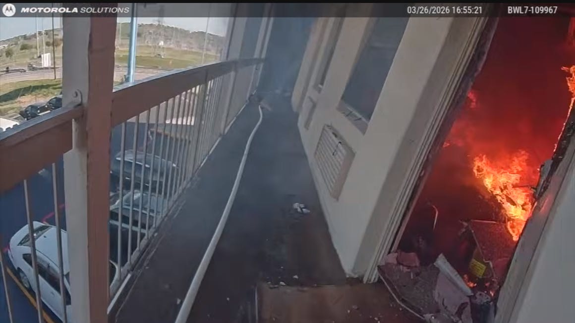 Bodycam: White Settlement, TX, police evacuate residents during motel fire.