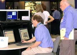 John Waldstein, president and CEO of International Electronics, Inc. (IEI) provides a demonstration to an attendee at the the 2005 Systems Integration Expo in Orlando. John Waldstein, president and CEO of International Electronics, Inc. (IEI) provides a demonstration to an attendee at the the 2005 Systems Integration Expo in Orlando.