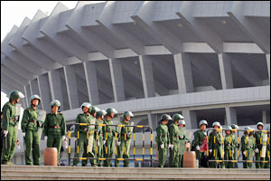 Paramilitary police stand outside the stadium before the 2005 Asian Champions League match between Japan's Yokohama F Marinos and China's Shandong Luneng in Jinan in China's Shandong province Wednesday, May 11, 2005. Thousands of police, security guard