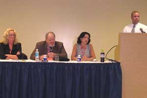 Panelists (left to right: Susan Brady, Security Dealer; Ron Walters, SIAC; Patty Bimonte, Miami-Dade Police Department; Doug Bassett, Brink's Home Secuirty) discuss alarm management at the 2005 Americas Fire & Security Expo.
