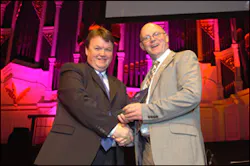 Antony Elliott (left), president of ASIAL, presents the award for Best New Product to Chris Boyce, commercial director, Dedicated Micros. Antony Elliott (left), president of ASIAL, presents the award for Best New Product to Chris Boyce, commercial director, Dedicated Micros.