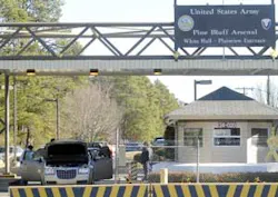 Guards stationed at an entrance to the Pine Bluff Arsenal inspect exiting vehicles Wednesday, Jan. 25, 2006 in Pine Bluff, Ark., after three unauthorized people, according to officials. were spotted on the grounds earlier Wednesday. The Pine Bluff Arsenal Guards stationed at an entrance to the Pine Bluff Arsenal inspect exiting vehicles Wednesday, Jan. 25, 2006 in Pine Bluff, Ark., after three unauthorized people, according to officials. were spotted on the grounds earlier Wednesday. The Pine Bluff Arsenal