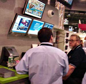 Demonstrating SAI's IP-networked access control system at the DVTel booth during ISC West