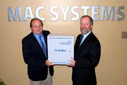 John Moss of S2 Security Corporation recognizes Bob McMenimon of systems integrator MAC Systems. John Moss of S2 Security Corporation recognizes Bob McMenimon of systems integrator MAC Systems.