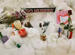 Flowers, candles, and small notes sit in the snow Friday, Feb. 15, 2008, on the campus of Northern Illinois University near Cole Hall, the scene where a lone gunman shot and killed six Thursday on the NIU in DeKalb, Ill. Flowers, candles, and small notes sit in the snow Friday, Feb. 15, 2008, on the campus of Northern Illinois University near Cole Hall, the scene where a lone gunman shot and killed six Thursday on the NIU in DeKalb, Ill.
