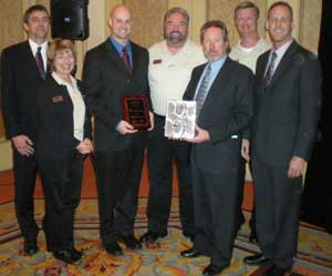 Members of Middle Atlantic Products' West Coast Sales Team present the award of Security Market Representative of the Year to members of GP Marketing.