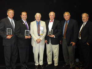 Left to right: Dave Simon, Jon Sargent, Bill Moody, Bill Cooper, Stan Martin and Ron Walters. Simon, Sargent and Cooper were on hand to receive the Moody award from SIAC's Ron Walters and executive director Stan Martin.