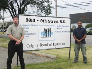 Robert Schofield of Sielox (left) joins Dan Jones at Calgary BOE headquarters.
