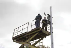 Champions and Data Consultants staff discuss the installation of intelligent security cameras to assist the ferry business on Harsens Island, northeast of Detriot. Champions and Data Consultants staff discuss the installation of intelligent security cameras to assist the ferry business on Harsens Island, northeast of Detriot.