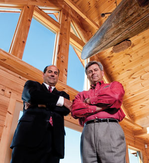 Blue Ridge Log Cabins&rsquo; (BRLC) owner and president Chip Smith (right) and Robert Rognstad, global account manager for systems integrator ADT Security Services, Boca Raton, Fla., (left) made it a team effort to not only monitor security for the BRLC manufacturing campus in Campobello, S.C. but to provide safety to employees and visitors as well. Photo courtesy of Conrad LaRosa, Showcase Marketing, Greenville, S.C.