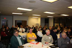 Attendees discussed the issue of fire protection districts establishing their own alarm monitoring businesses at the Illinois Electronic Security Association's (IESA) quarterly meeting. Attendees discussed the issue of fire protection districts establishing their own alarm monitoring businesses at the Illinois Electronic Security Association's (IESA) quarterly meeting.