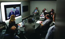 In a teleconference from ADT's Integrated Solutions Center in Colorado, (from left on screen) ADT Director of Integrated Strategy Jim Lantrip and Cisco Physical Security Business Unit Vice President Bill Stuntz address security media members gathered in Chicago for the ADT Media Summit. In a teleconference from ADT's Integrated Solutions Center in Colorado, (from left on screen) ADT Director of Integrated Strategy Jim Lantrip and Cisco Physical Security Business Unit Vice President Bill Stuntz address security media members gathered in Chicago for the ADT Media Summit.