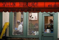 Investigators work iside the shop were six people were killed and three were wounded in a shooting at a hair salon in Seal Beach, Calif., Wednesday, Oct. 12, 2011. Investigators work iside the shop were six people were killed and three were wounded in a shooting at a hair salon in Seal Beach, Calif., Wednesday, Oct. 12, 2011.