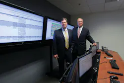 Craig and Al Albrecht pose in their Security Network Operations Center where they monitor and support their clients. Craig and Al Albrecht pose in their Security Network Operations Center where they monitor and support their clients.