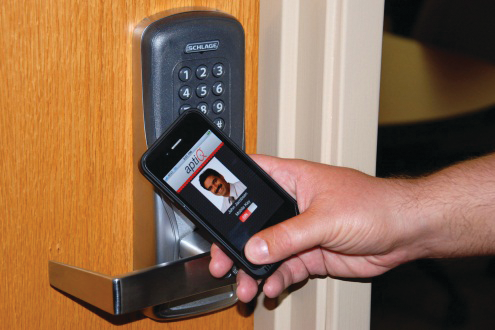 Ingersoll Rand's aptiQmobile web-based key management system will send access control credentials over the air to Near Field Communications (NFC)-enabled smartphones, allowing people to use their phones to enter buildings in place of their smart-card ID badges.