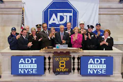 Members of ADT's senior leadership team ring the opening bell at the New York Stock Exchange on Monday, Oct. 8, 2012. Members of ADT's senior leadership team ring the opening bell at the New York Stock Exchange on Monday, Oct. 8, 2012.