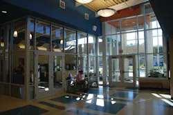 Many schools have an entrance vestibule — usually a glass enclosed area with locked doors — that directs visitors to the main office. Many schools have an entrance vestibule — usually a glass enclosed area with locked doors — that directs visitors to the main office.