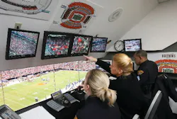 Cleveland police officers monitor cameras they control from the Operations Center at Cleveland Browns Stadium. Cameras throughout the stadium can be operated by joystick to pivot and zoom in on fans to detect problems. Cleveland police officers monitor cameras they control from the Operations Center at Cleveland Browns Stadium. Cameras throughout the stadium can be operated by joystick to pivot and zoom in on fans to detect problems.