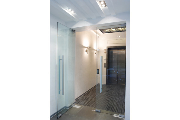 The Securitron R100 Surface Mounted Wireless Reader offers an elegant way to extend access control to glass, stone, granite or marble entryways. The R100 uses wireless communication between the reader and an Aperio&circledR; hub to connect to the access control system. Installation of the R100 is simple and convenient, requiring no drilling or pulling of wires to the door and can be adhered to the outside of a glass door in a few minutes.