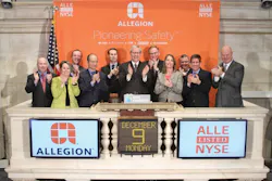 Allegion Chariman, President and CEO Dave Petratis (center) rings the opening bell at the New York Stock Exchange on Monday with other company executives. Allegion Chariman, President and CEO Dave Petratis (center) rings the opening bell at the New York Stock Exchange on Monday with other company executives.