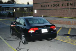 This photo released last month in the long-anticpated report on the Sandy Hook Elementary School shooting shows the car of shooter Adam Lanza parked outside the school. This photo released last month in the long-anticpated report on the Sandy Hook Elementary School shooting shows the car of shooter Adam Lanza parked outside the school.