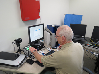 FPS director Floyd Jennings works with the integrated video/access control system.
