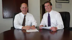 Michael S. Rogers, left, and Dan Prochnow rely on partners to help them fulfill many of the contracts they land with the federal government. Michael S. Rogers, left, and Dan Prochnow rely on partners to help them fulfill many of the contracts they land with the federal government.