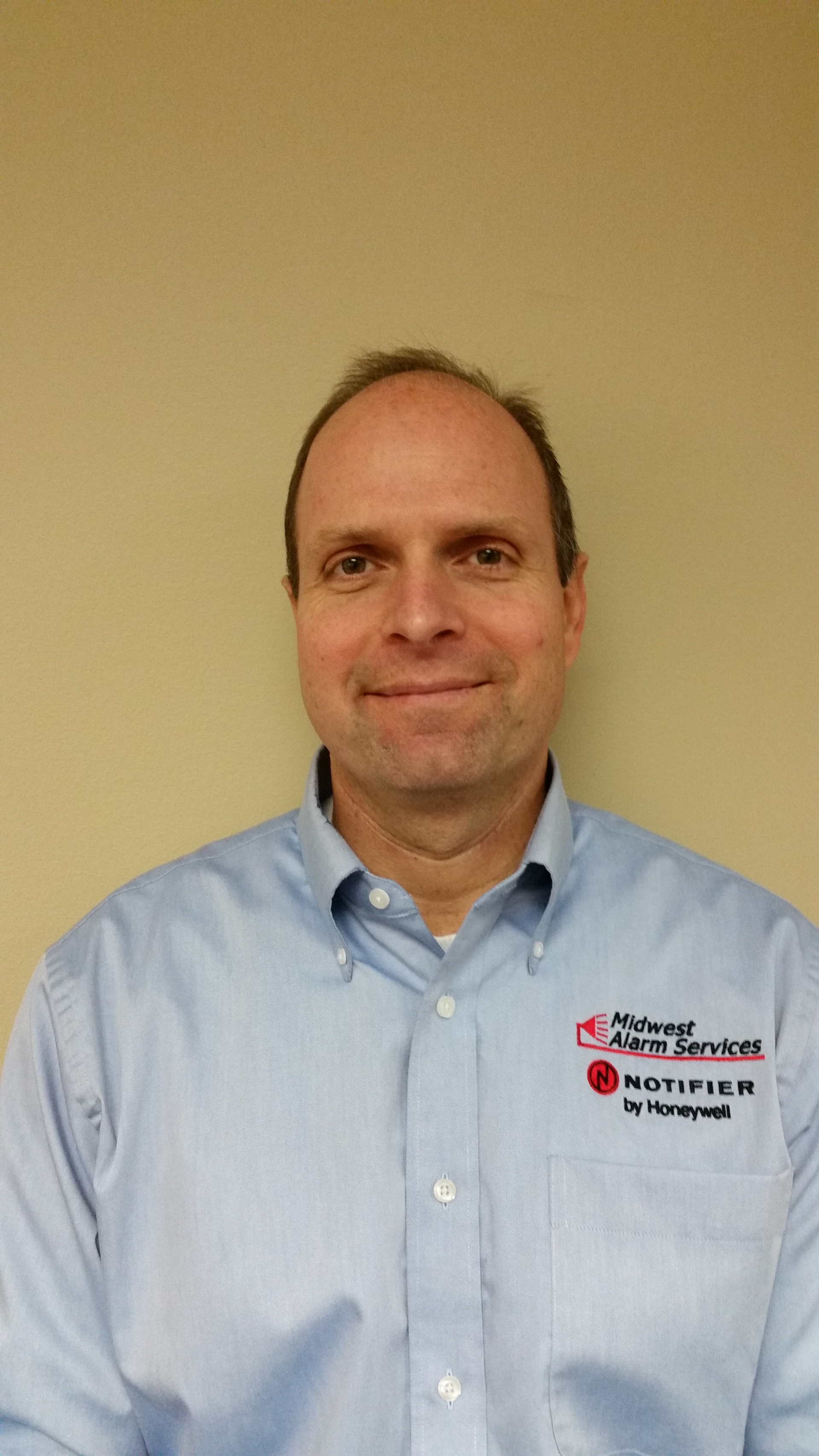 Doug Richard took over as president of Midwest Alarm Services.