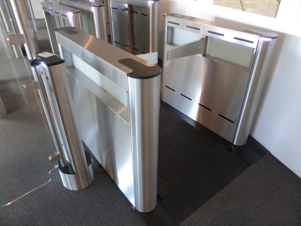Smarter Security's Fastlane Plus 150SA turnstile features a swing arm barrier, advanced multi-processor intelligence, and utilizes a high-density infrared beam array to detect the movement of individuals and objects in its field of vision.