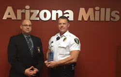 Arizona Mills Mall Security Professional Kevin Soulages receives the Tom Cernock Award from Account Manager Mark Lo Schiavo. Arizona Mills Mall Security Professional Kevin Soulages receives the Tom Cernock Award from Account Manager Mark Lo Schiavo.